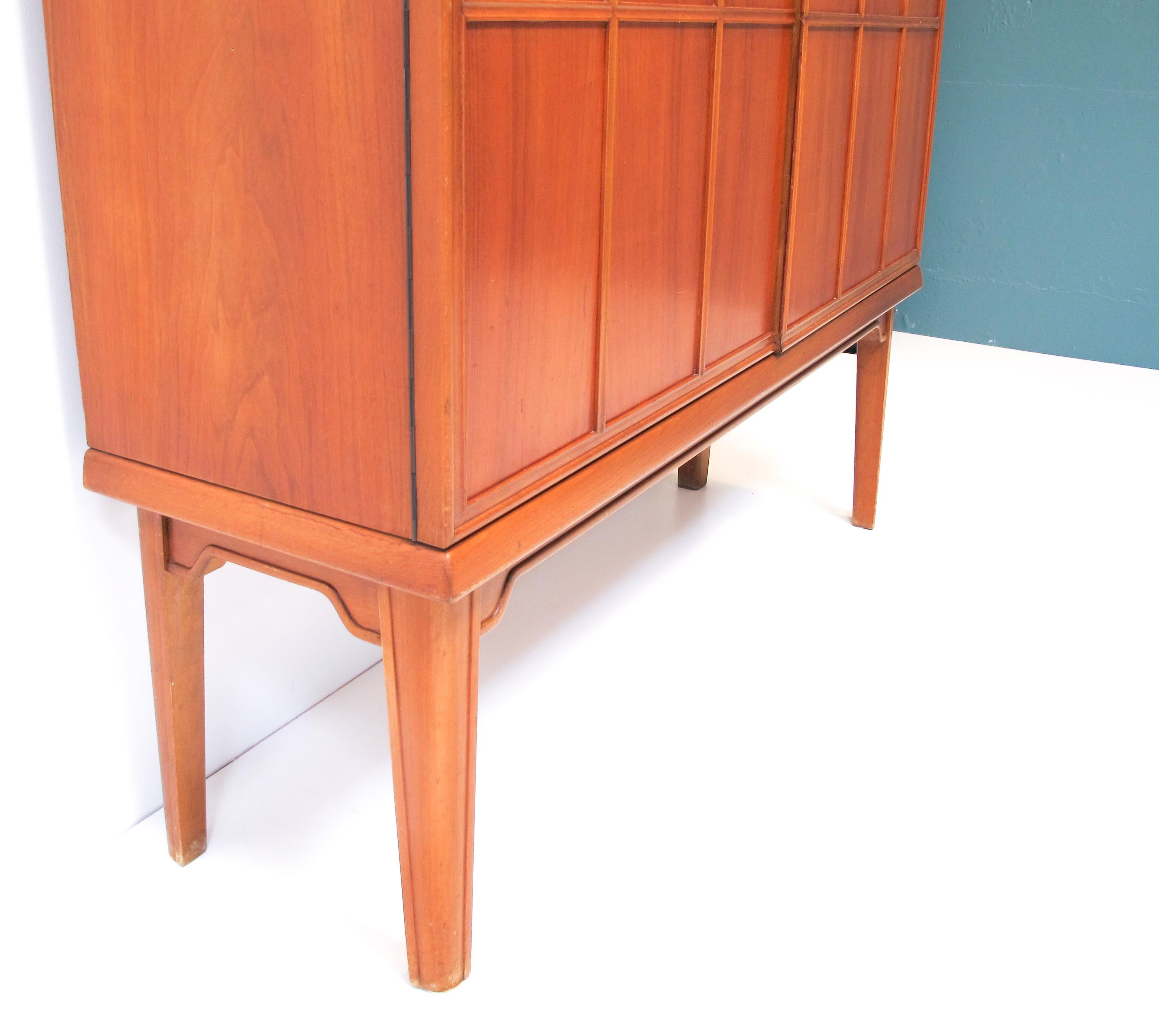 Cabinet Swedish modern with relief doors. 1940s
The cabinet have removable shelves.