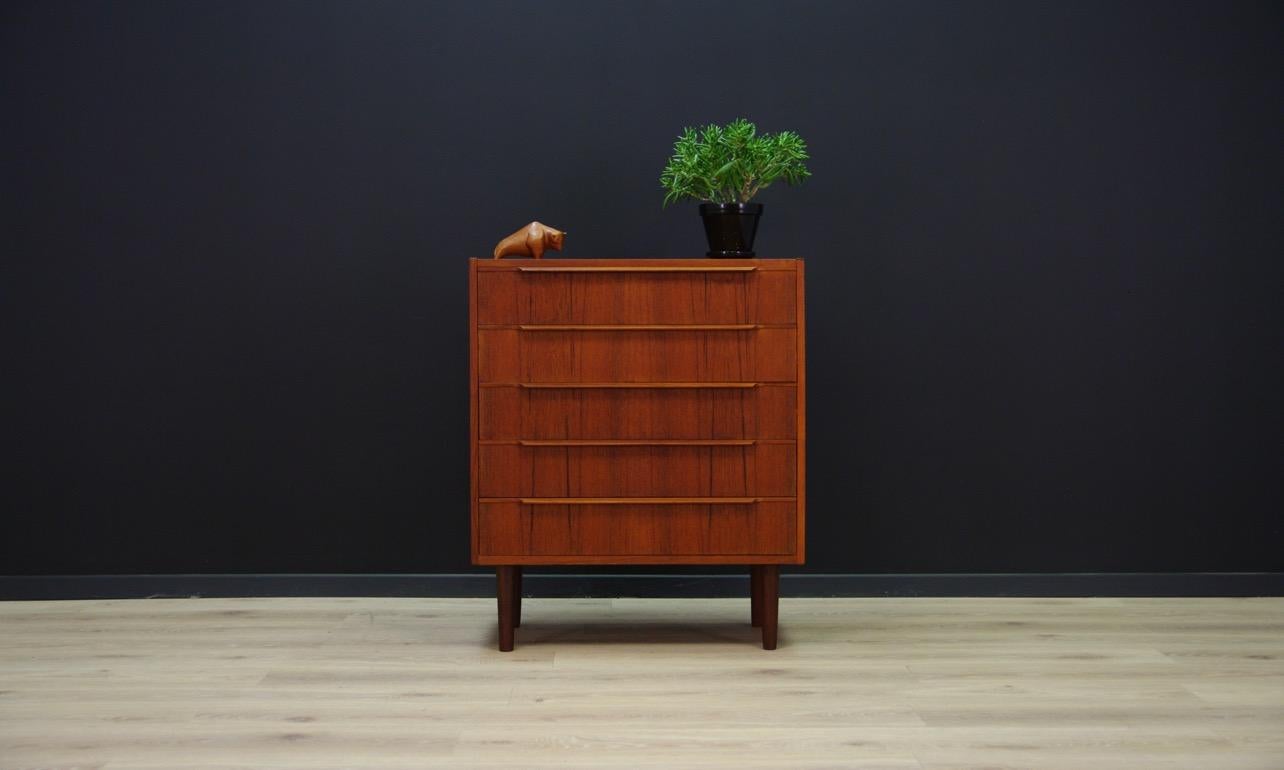 Classic cabinet from the 1960s-1970s, minimalist form - Danish design. Six large drawers. Item veneered with teak. Profiled handles made of teak. Preserved in good condition (small dings and scratches, filled veneer loss) - directly for