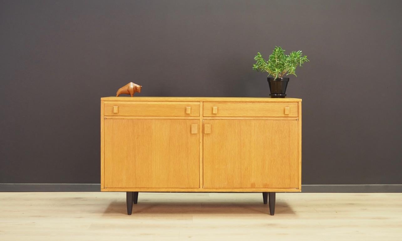 Classic cabinet from the 1960s-1970s, Minimalist form - Danish design. Roomy interior with a shelf behind the doors, additionally two external drawers. The whole veneered with ash. Preserved in good condition (small bruises and scratches, filled