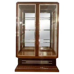 cabinet with three sides glazed France around 1930.  Rosewood veneer.