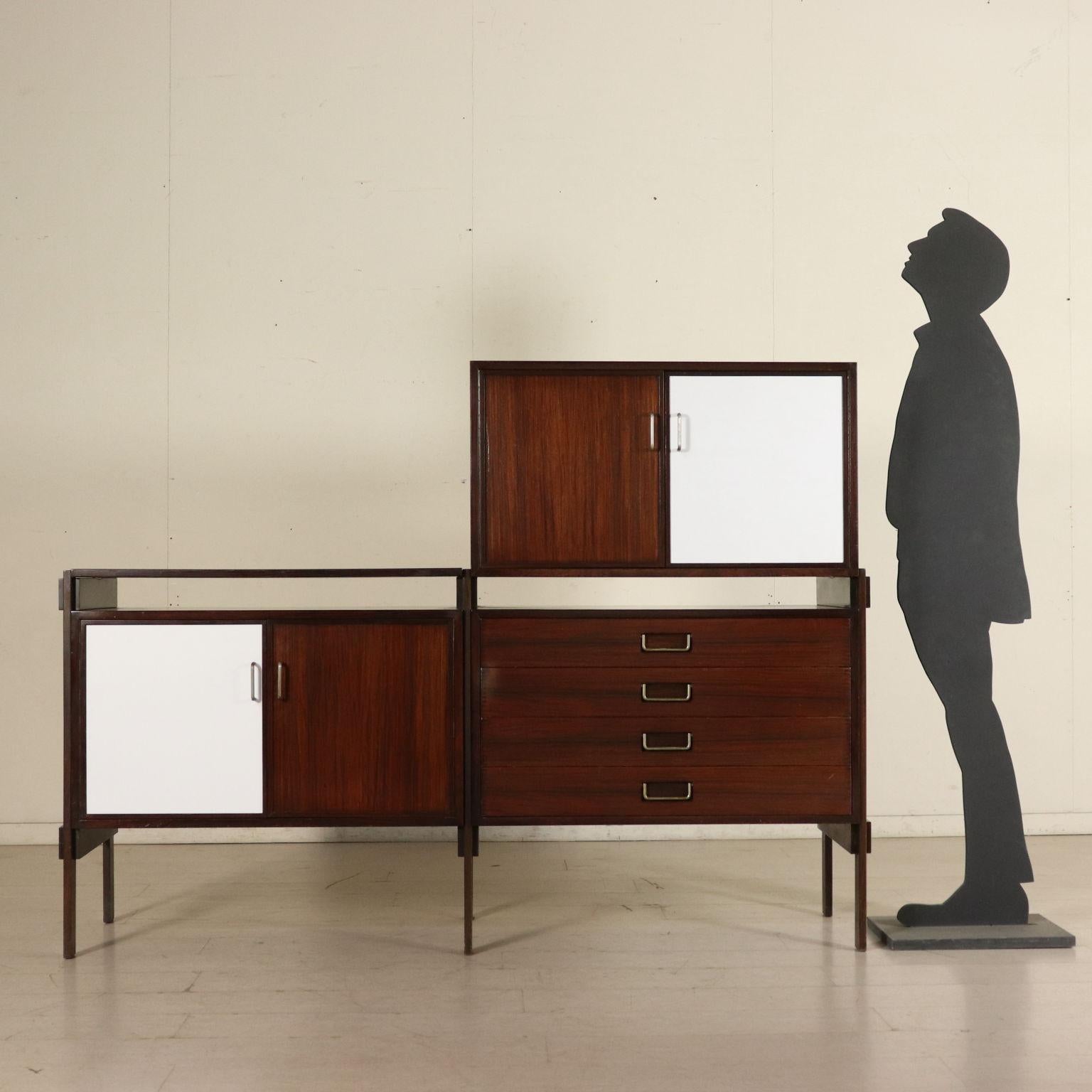 A cabinet made of wood, Formica and brass handles. Manufactured in Italy, 1960s.