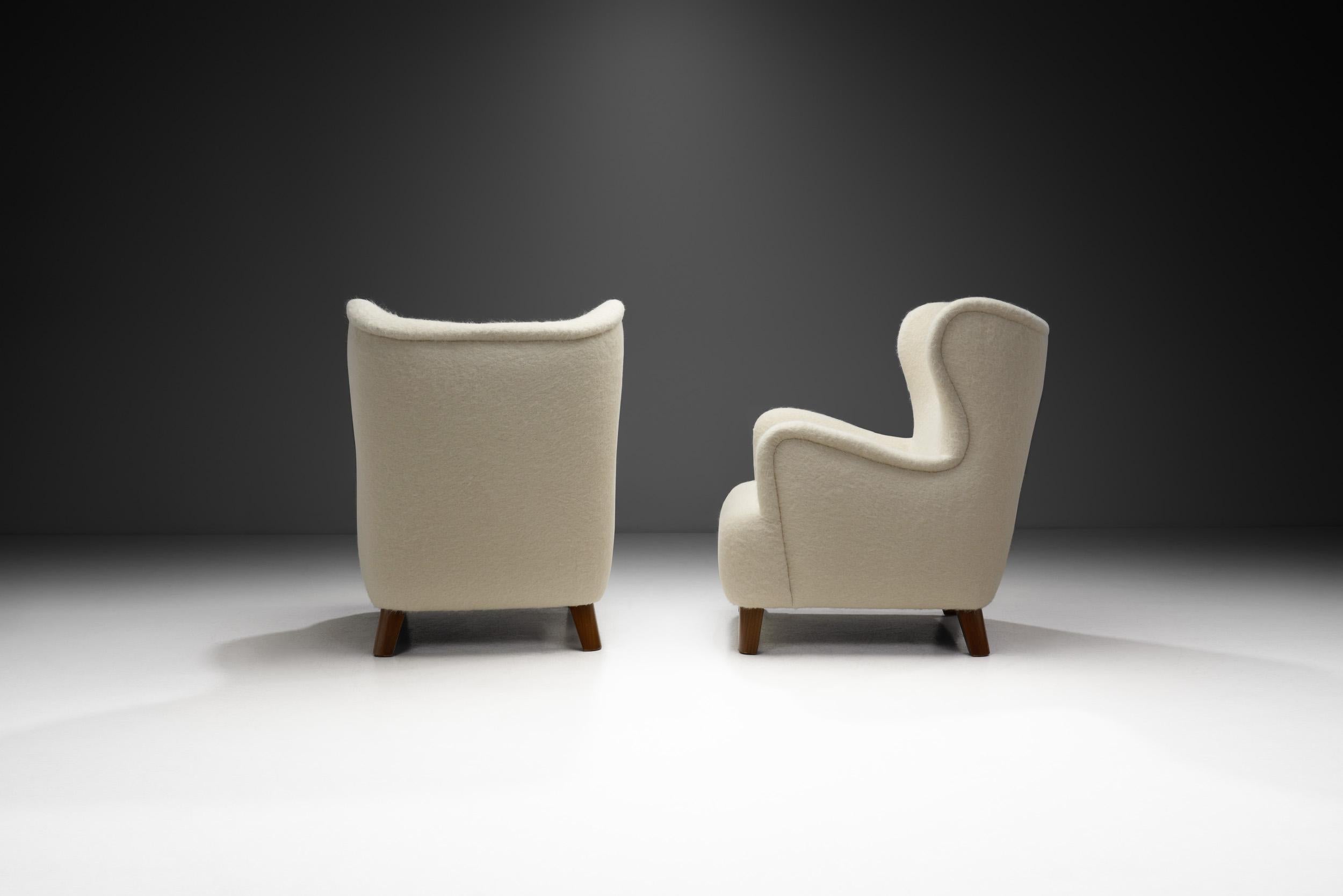 European Cabinetmaker Armchairs with Wood Feet, Europe first half of the 20th century For Sale