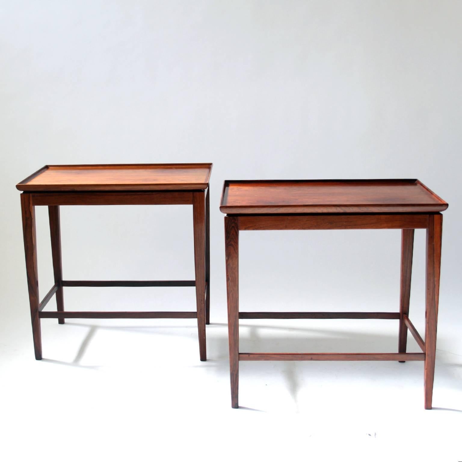 CABINETMAKER JACOB KJÆR  - SCANDINAVIAN MODERN

A beautiful pair of lamp tables or bedside tables by the Danish Cabinetmaker Jacob Kjær. 

The side tables are made of rosewood in 1950s. They are beautifully handcrafted with raised table edges and
