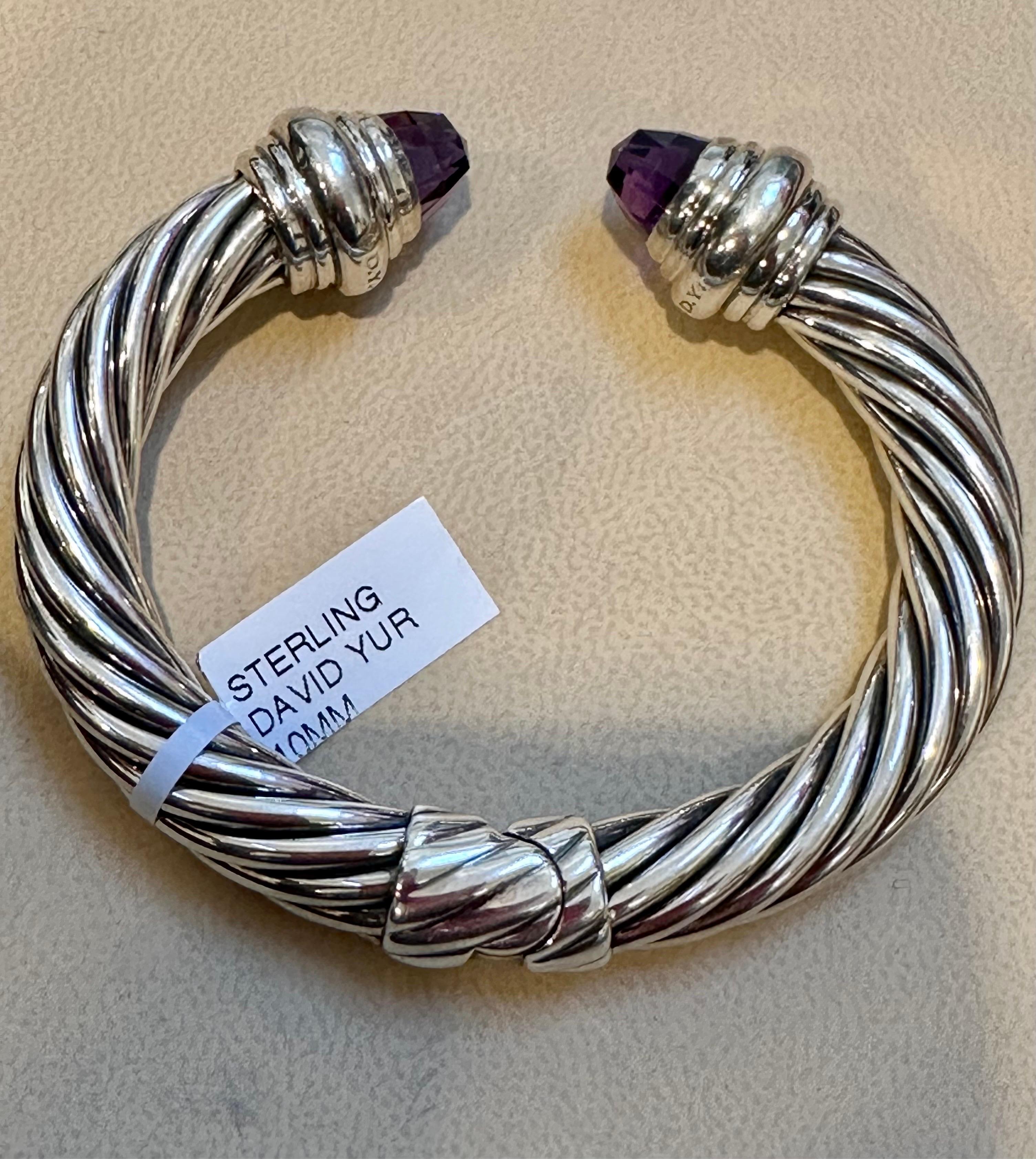 This pre-owned bangle is a beautiful piece of jewelry that showcases David Yurman's artistic signature style. Yurman's Cable design began as a bracelet that he hand-twisted from 50 feet of wire. Over the past 30 years, he has evolved the twisted