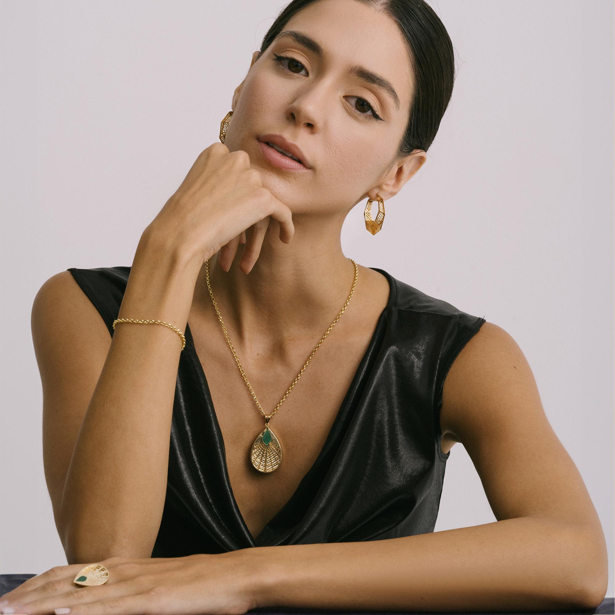 Exclusively crafted from genuine gold, Zelveti jewelry embodies purity and longevity. Available in 14 or 18 karat gold, Zelveti jewels are designed to whisper to your soul and carry forward your story across generations. The hallmark of 585 (14