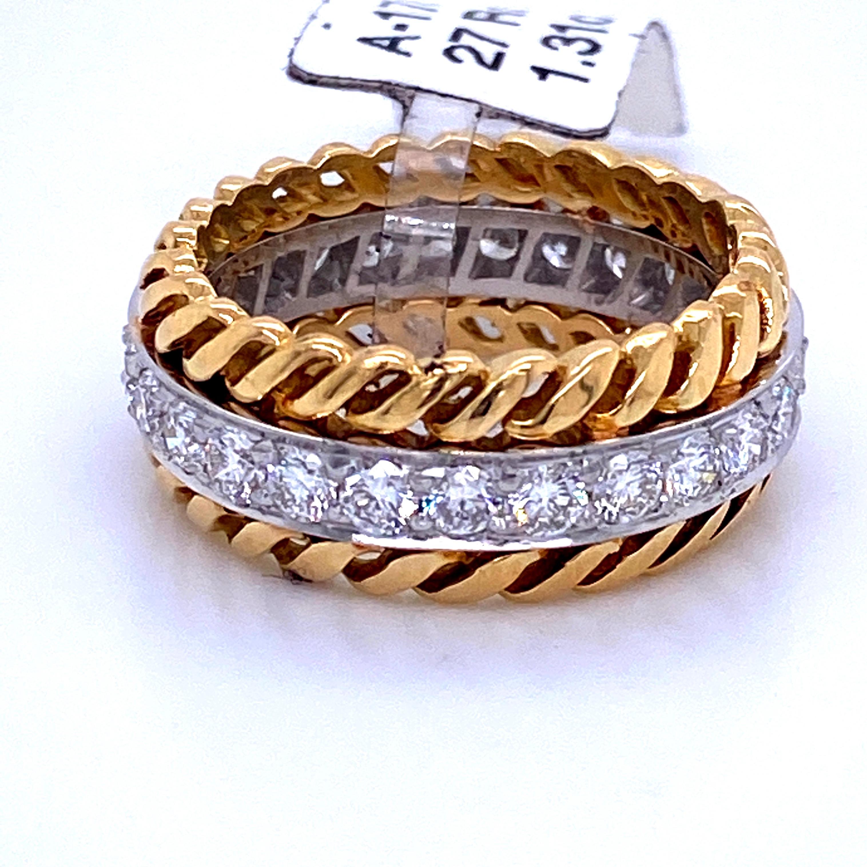 18K Yellow gold cable motif wedding band featuring one row of 27 round brilliants weighing 1.31 carats.
Color G
Clarity SI

Size 5 3/4