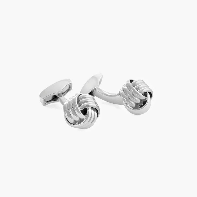 Cable Knot cufflinks in stainless steel

Our traditional knots use polished, clean lines and fluid movements to create a collection perfect for those who favour minimal elegance. Adding a high-shine finish to our rhodium plated base