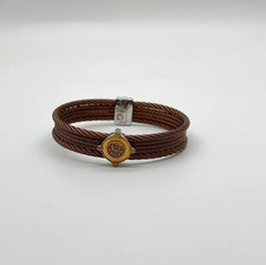 Bracciale a più file con filigrana e diamanti marroni in oro bianco 18 carati