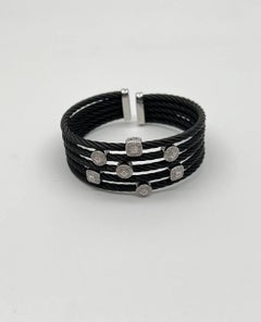 Bracciale a più file con filigrana e diamanti bianchi in oro bianco 18 carati