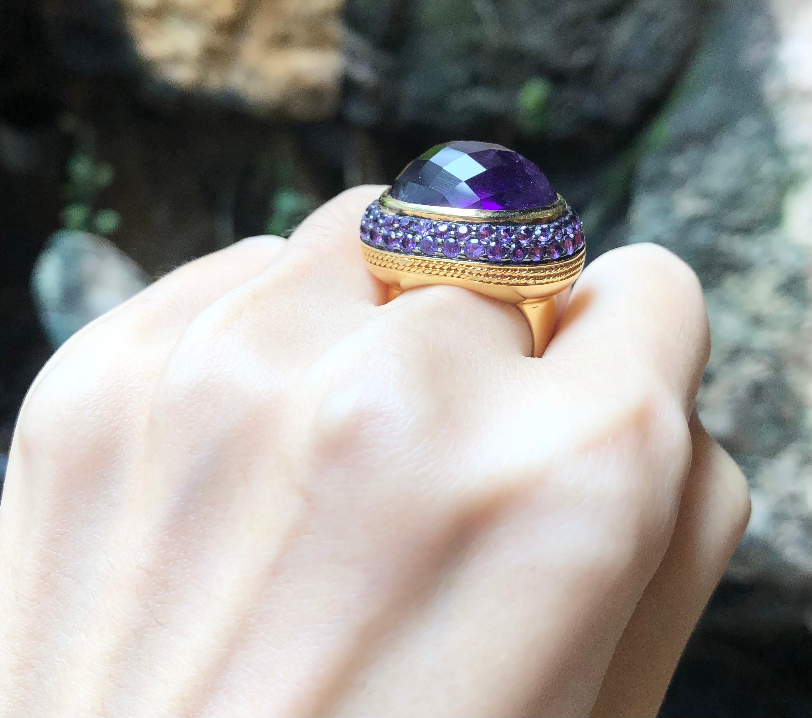 Contemporary Cabochon Amethyst with Amethyst Ring Set in 18 Karat Gold Settings For Sale
