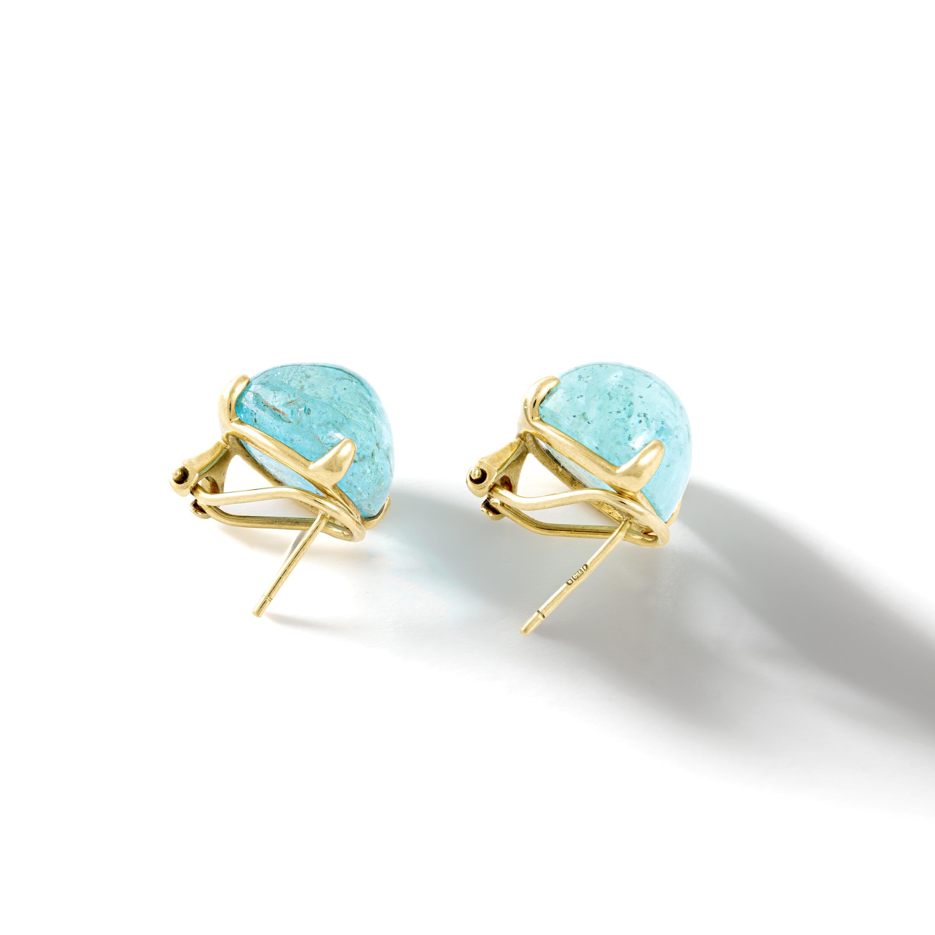 Cabochon Aquamarine on Yellow Gold 18k Ear clips.

Total height: 0.47 inch (1.20 centimeter).
Total width: 0.47 inch (1.20 centimeter).
Total thickness: 0.39 inch (1.00 centimeter).