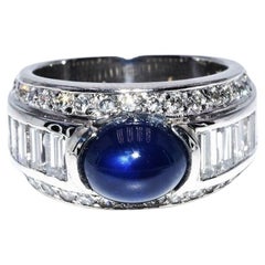   Cabochon de saphir naturel bleu et diamants  5.60 CT. TW. Bague cocktail