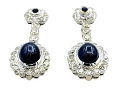 Cabochon Blue Sapphire and Diamond Halo Drop Earrings in 18 Karat White Gold