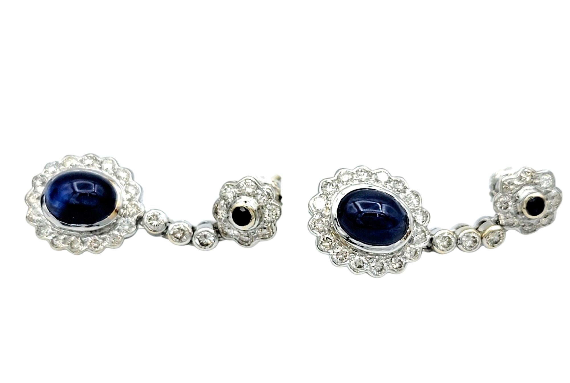 Contemporary Cabochon Blue Sapphire and Diamond Halo Drop Earrings in 18 Karat White Gold For Sale