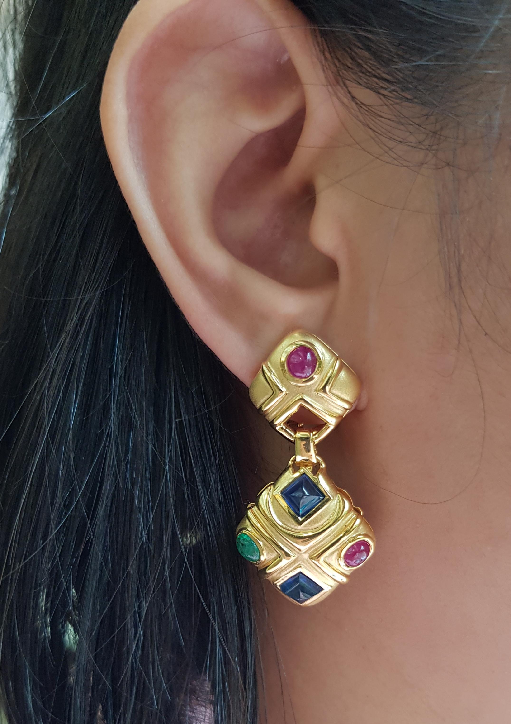 Cabochon Blue Sapphire 4.70 carats, Cabochon Ruby 2.11 carats and Cabochon Emerald 0.72 carat Earrings set in 18 Karat Gold Settings

Width:  2.3 cm 
Length: 4.4 cm
Total Weight: 26.57 grams

