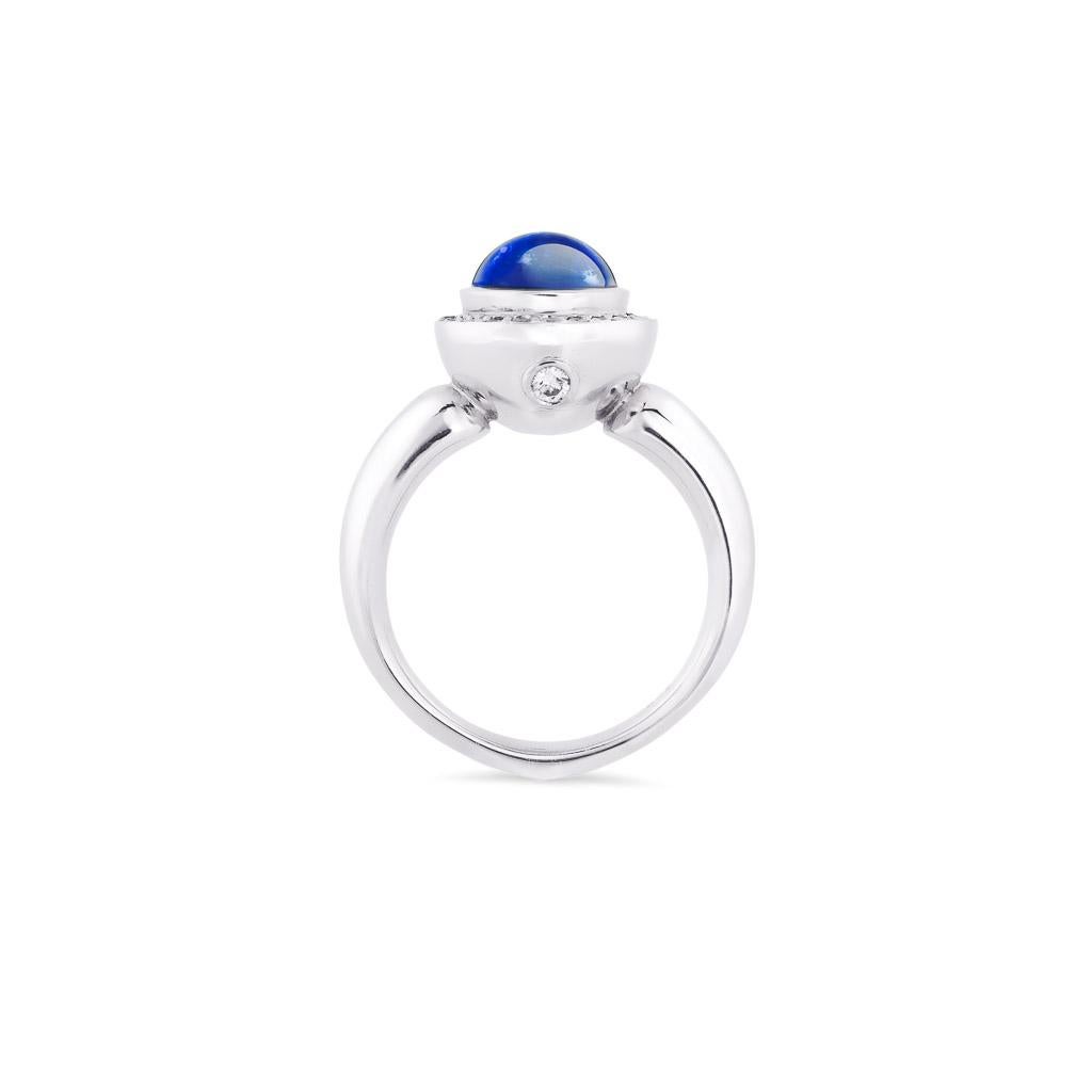 Old world charm. Be Inspired, Captivated and Elevated by the magic of rare coloured gemstones!
Superb Cabochon cut Ceylon blue Sapphire and diamond ring, handmade in 18ct white gold.
A very desirable gemstone due to its excellent colour, hardness,