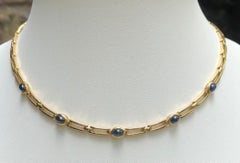 Cabochon Blue Sapphire Necklace Set in 18 Karat Gold Settings