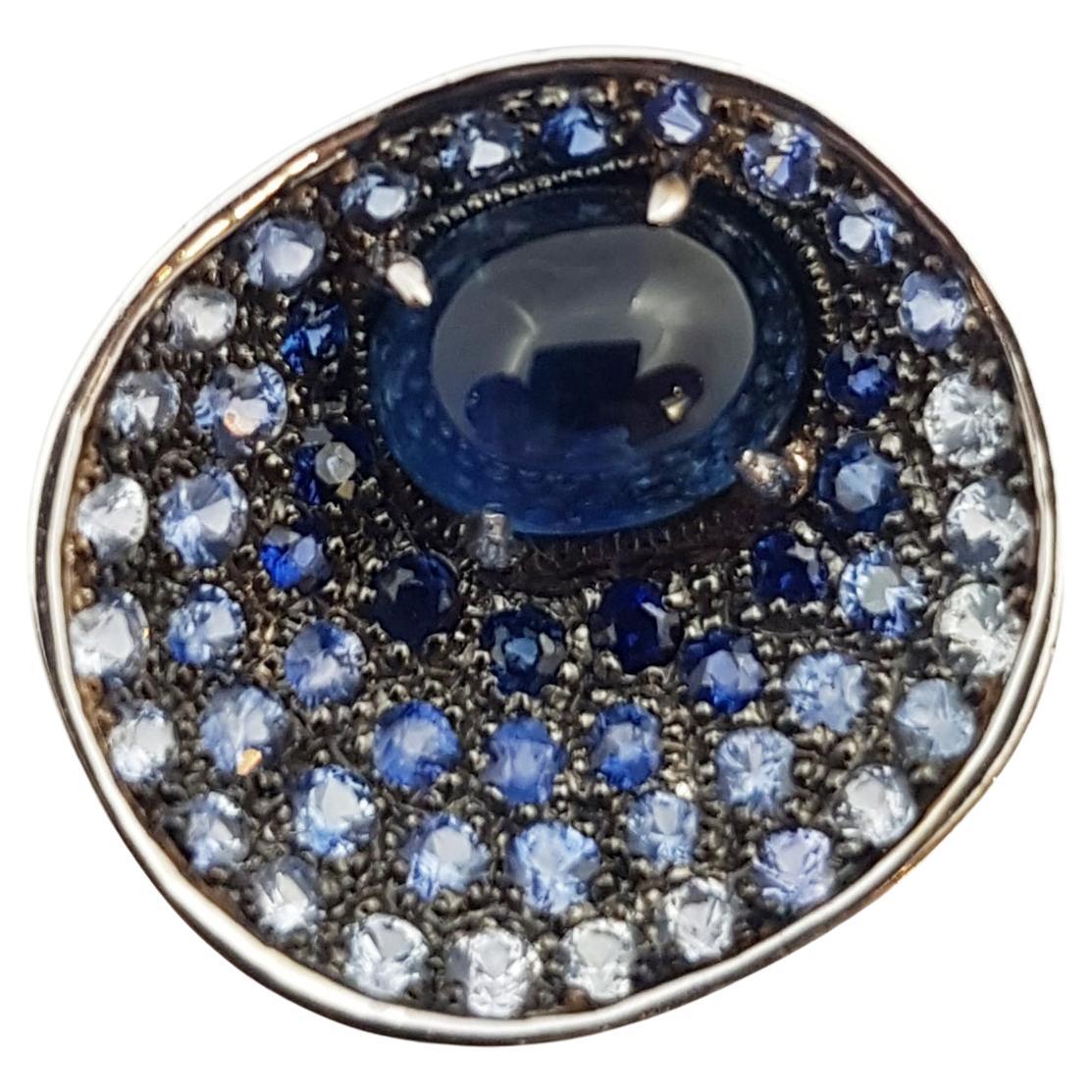 Cabochon Blue Sapphire with Blue Sapphire Rings Set in 18 Karat White Gold For Sale
