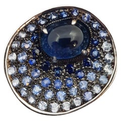 Cabochon Blue Sapphire with Blue Sapphire Rings Set in 18 Karat White Gold