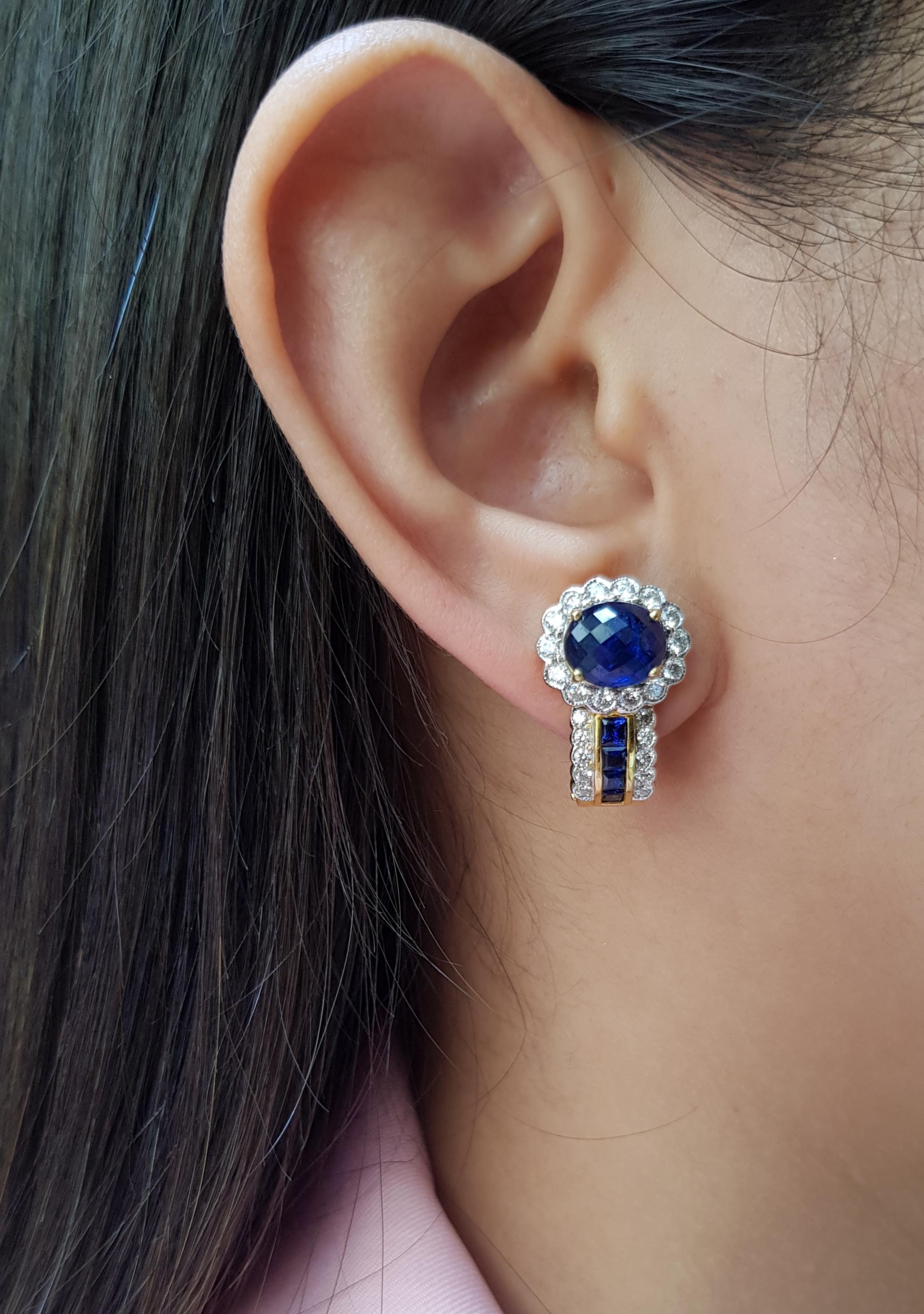 Cabochon Blue Sapphire 4.88 carats with Diamond 1.14 carats and Blue Sapphire 0.64 carat Earrings set in 18 Karat Gold Settings

Width: 1.3 cm
Length: 2.2 cm 

