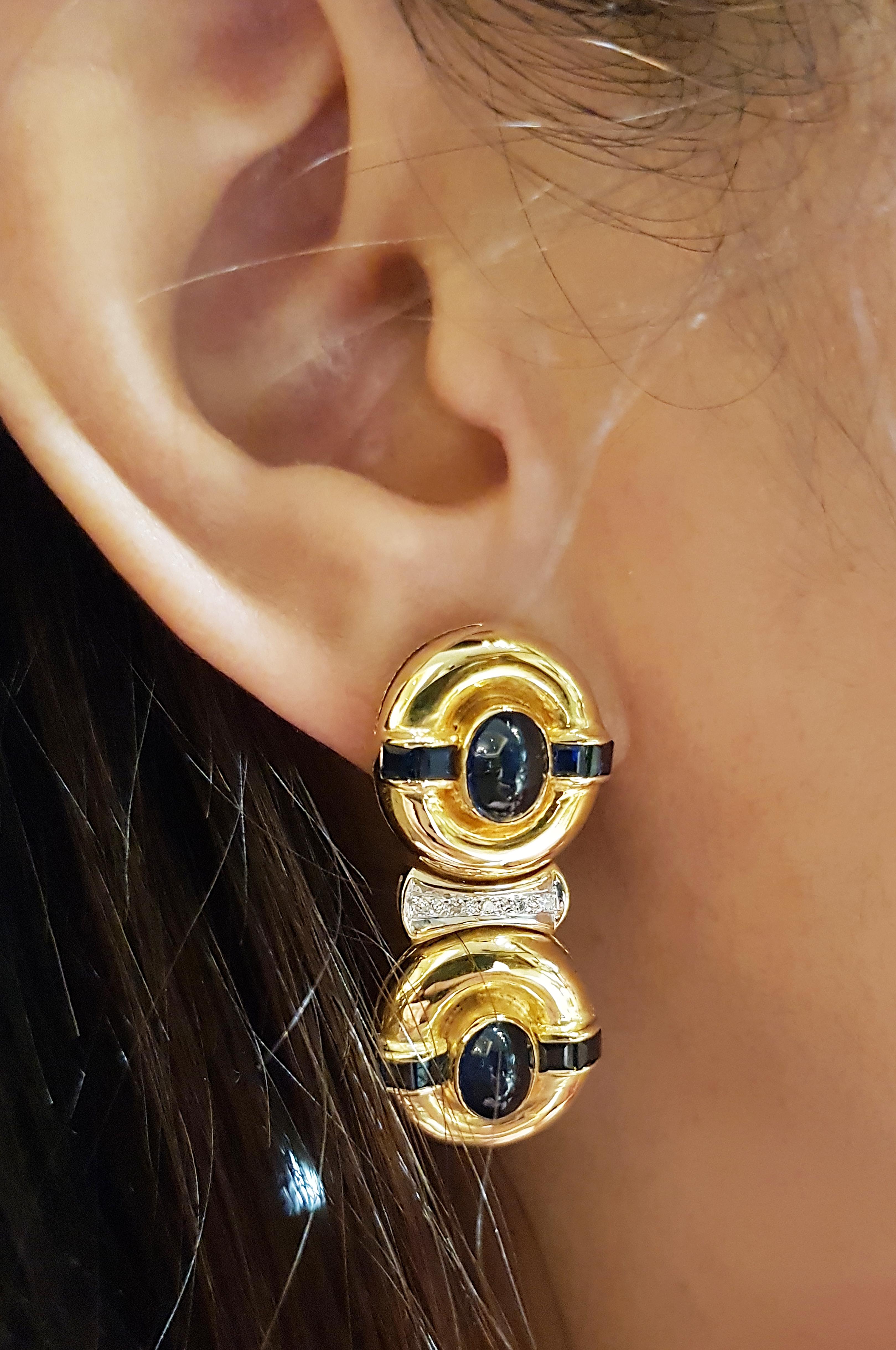 Cabochon Blue Sapphire 5.92 carats with Diamond 0.67 carat and Blue Sapphire 1.67 carats Earrings set in 18 Karat Gold Settings

Width:  1.5 cm 
Length: 3.5 cm
Total Weight: 18.64 grams

