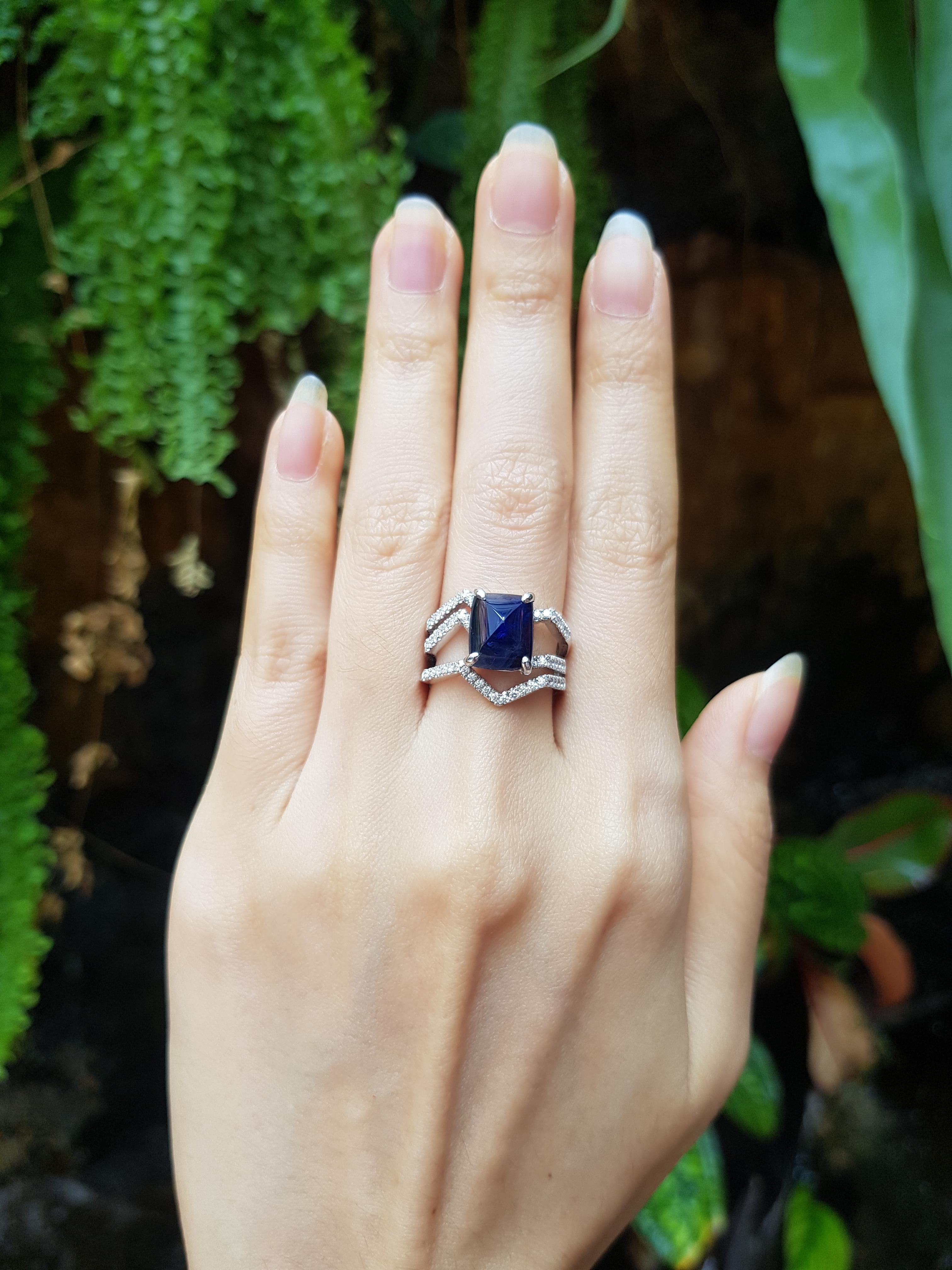 Cabochon Blue Sapphire 4.10 carats with Diamond 0.31 carat Ring set in 18 Karat White Gold Settings
(GIT Certified, The Gem and Jewelry Institute of Thailand)

Width:  1.5 cm 
Length: 2.0 cm
Ring Size: 52
Total Weight: 8.91 grams

