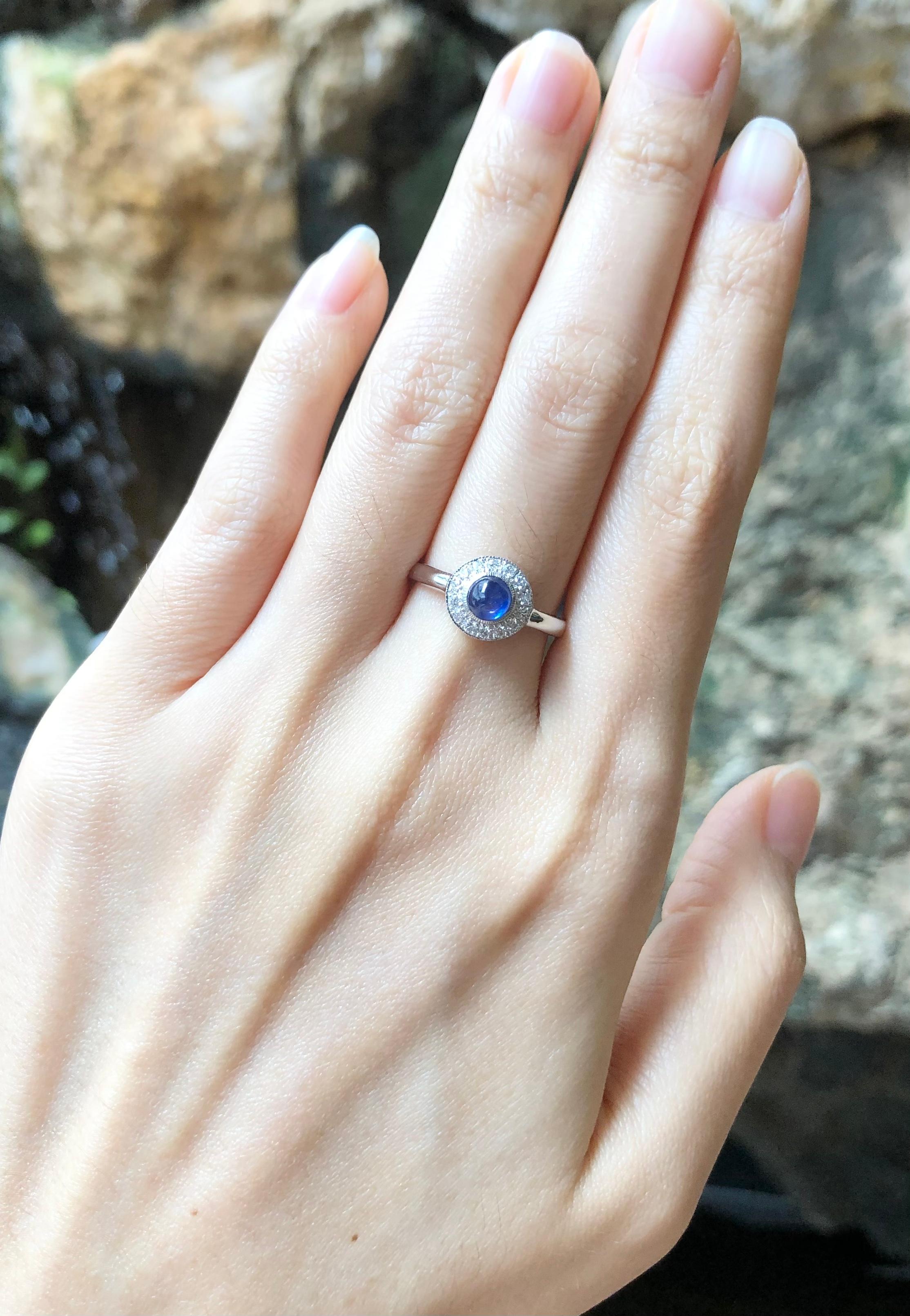Contemporary Cabochon Blue Sapphire with Diamond Ring Set in 18 Karat White Gold Settings For Sale