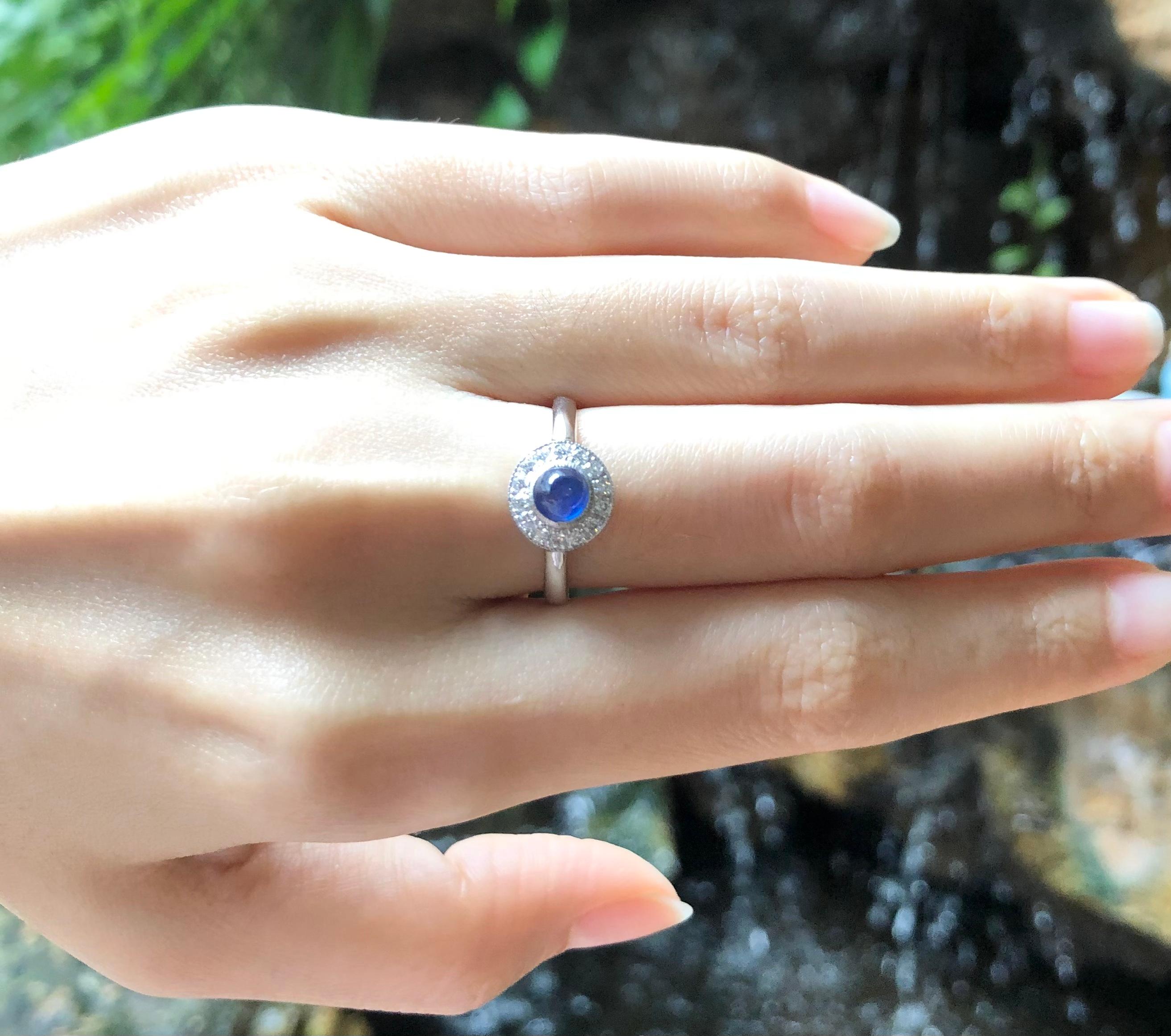 Women's Cabochon Blue Sapphire with Diamond Ring Set in 18 Karat White Gold Settings For Sale