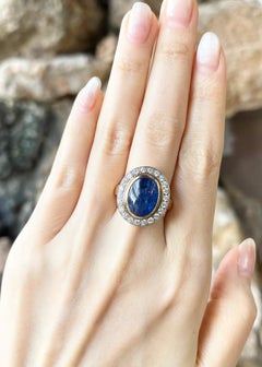 Cabochon Blue Sapphire with Diamond Ring set in 18K Gold Settings