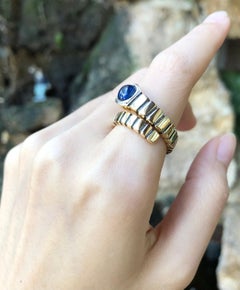 Cabochon Blue Sapphire with Diamond Serpent Ring Set in 18 Karat Gold Settings