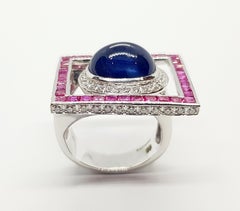 Cabochon Blue Sapphire with Ruby and Diamond Ring Set in 18 Karat White Gold