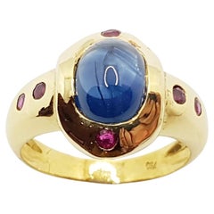 Cabochon Blue Sapphire with Ruby Ring Set in 18 Karat Gold Settings