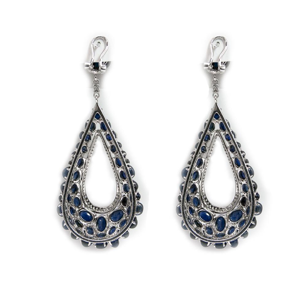 Contemporary Cabochon Blue Sapphires Dangle Earrings with Accent Diamonds 18 Karat White Gold For Sale