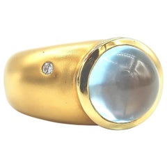 Cabochon Blue Topaz Step 18 Karat Yellow Gold Ring with a Diamond Speck on Side