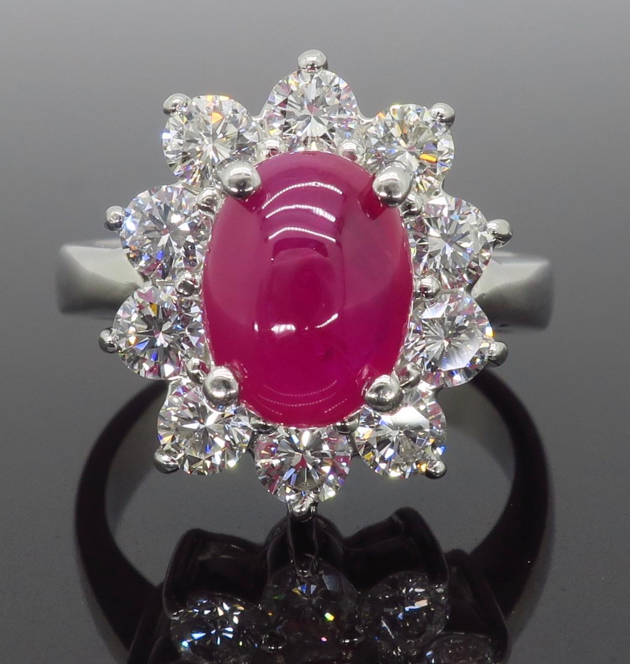 Oval Cut Cabochon Burma Ruby and Diamond Halo Ring in Platinum