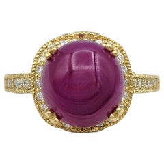 Cabochon Burmese Ruby and Diamond Halo Cocktail Ring in 14 Karat Yellow Gold