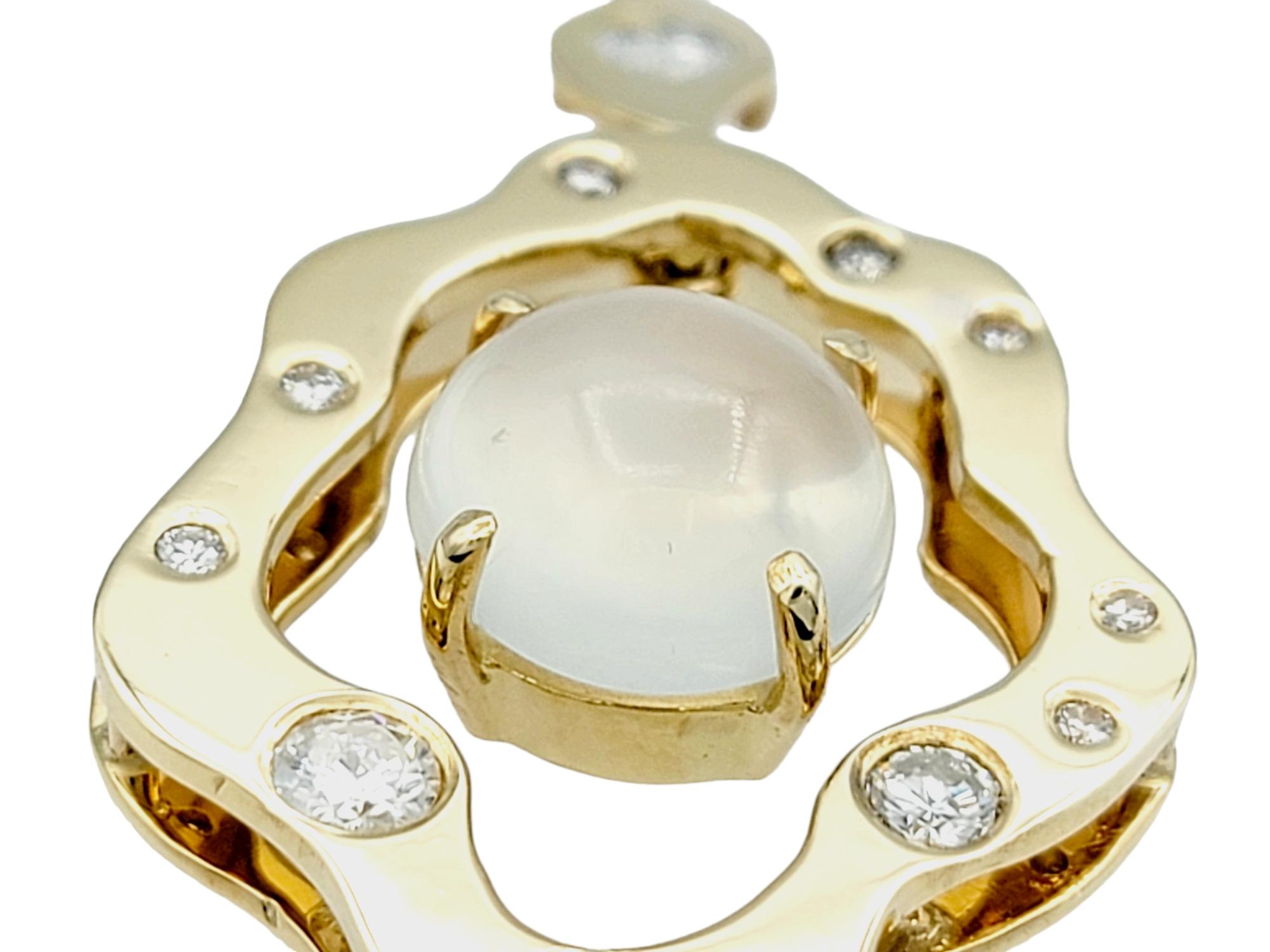 This 14 karat yellow gold pendant is an embodiment of artistic elegance, boasting an organic and uniquely asymmetrical shape that is both captivating and distinctive. Its design sets it apart from conventional jewelry, emphasizing the beauty of