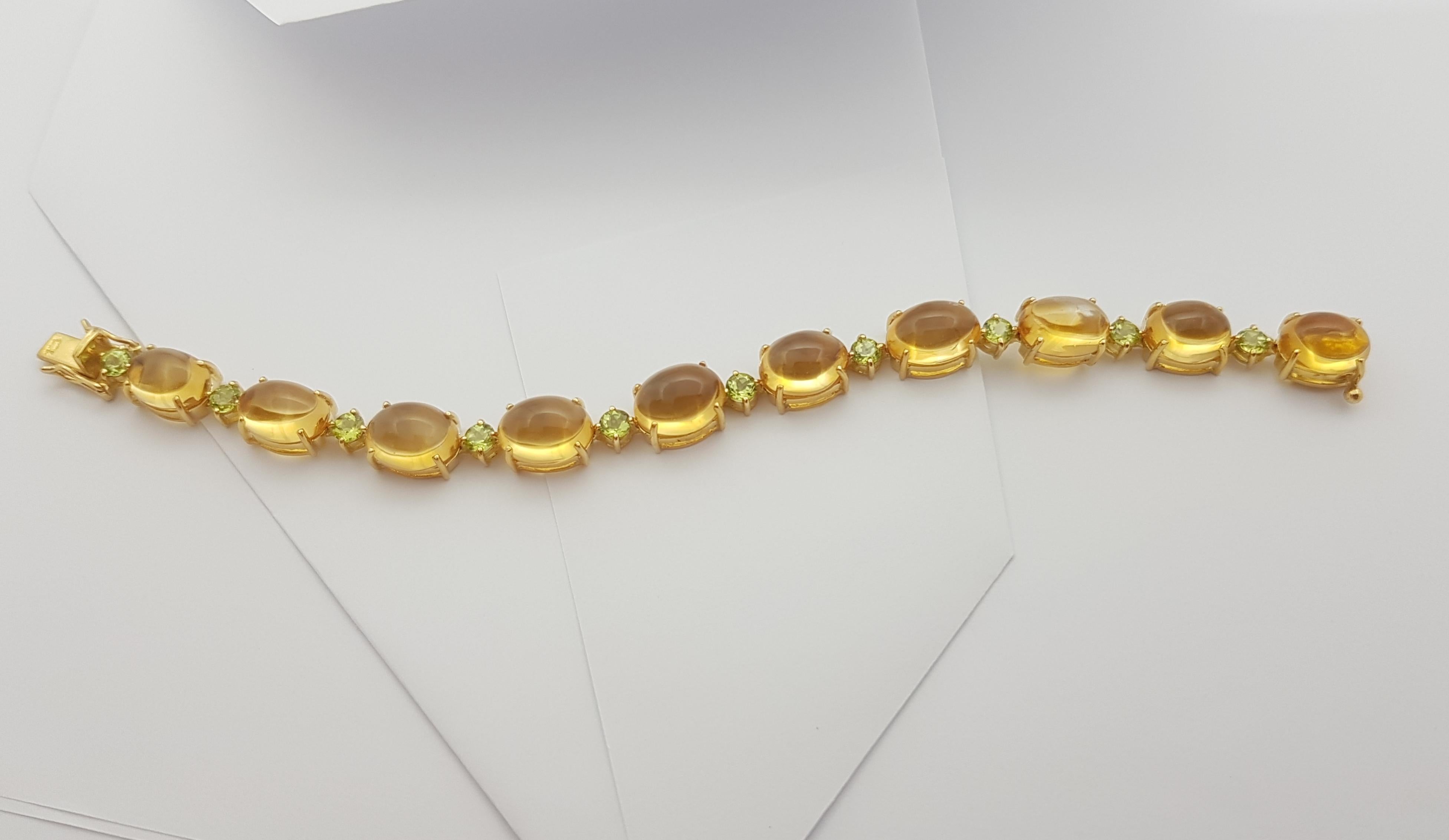 Bracelet en or 18 carats serti d'un cabochon de citrine et de péridots en vente 9