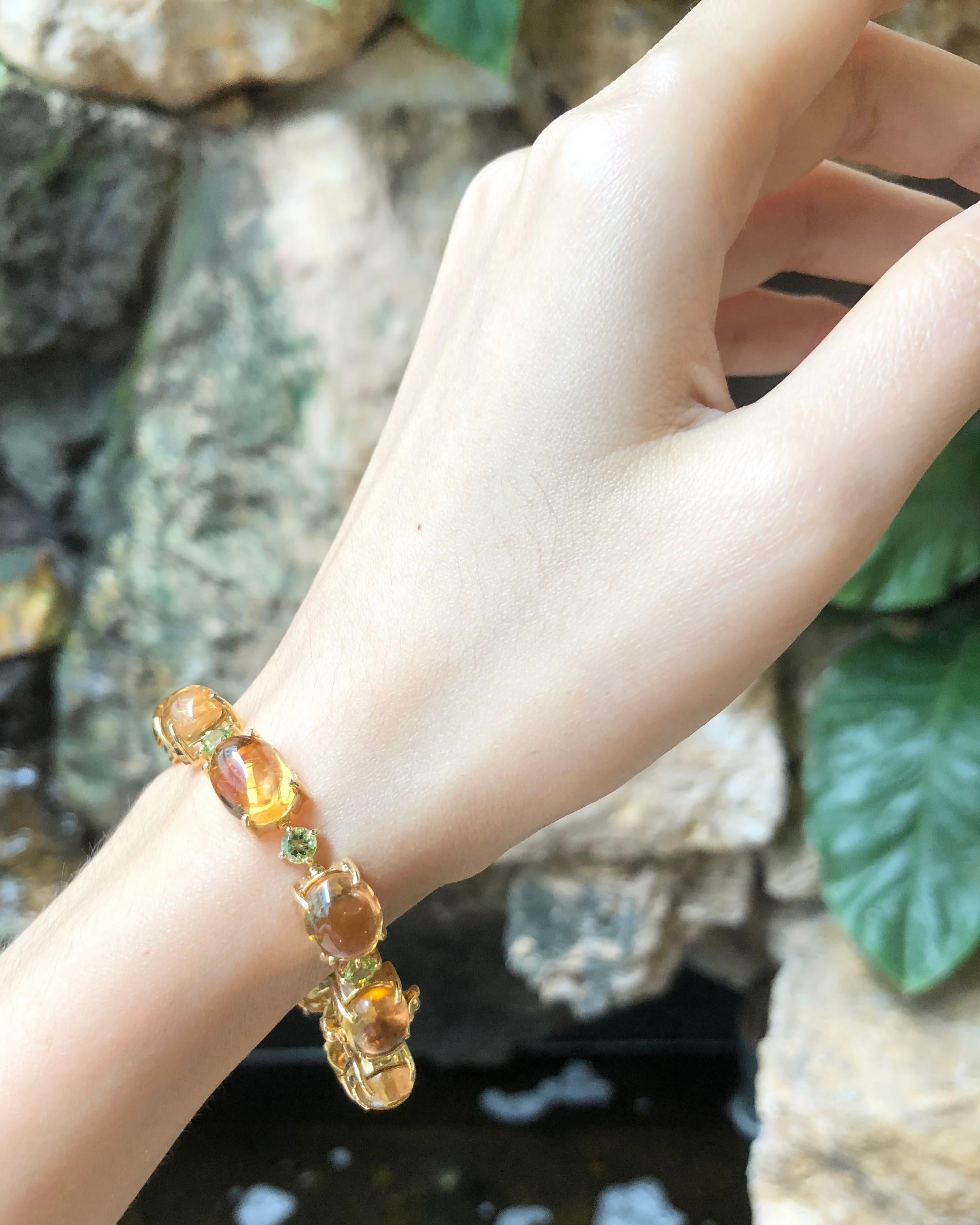 Cabochon Citrine with Peridot Bracelet set in 18 Karat Gold Settings For Sale 1