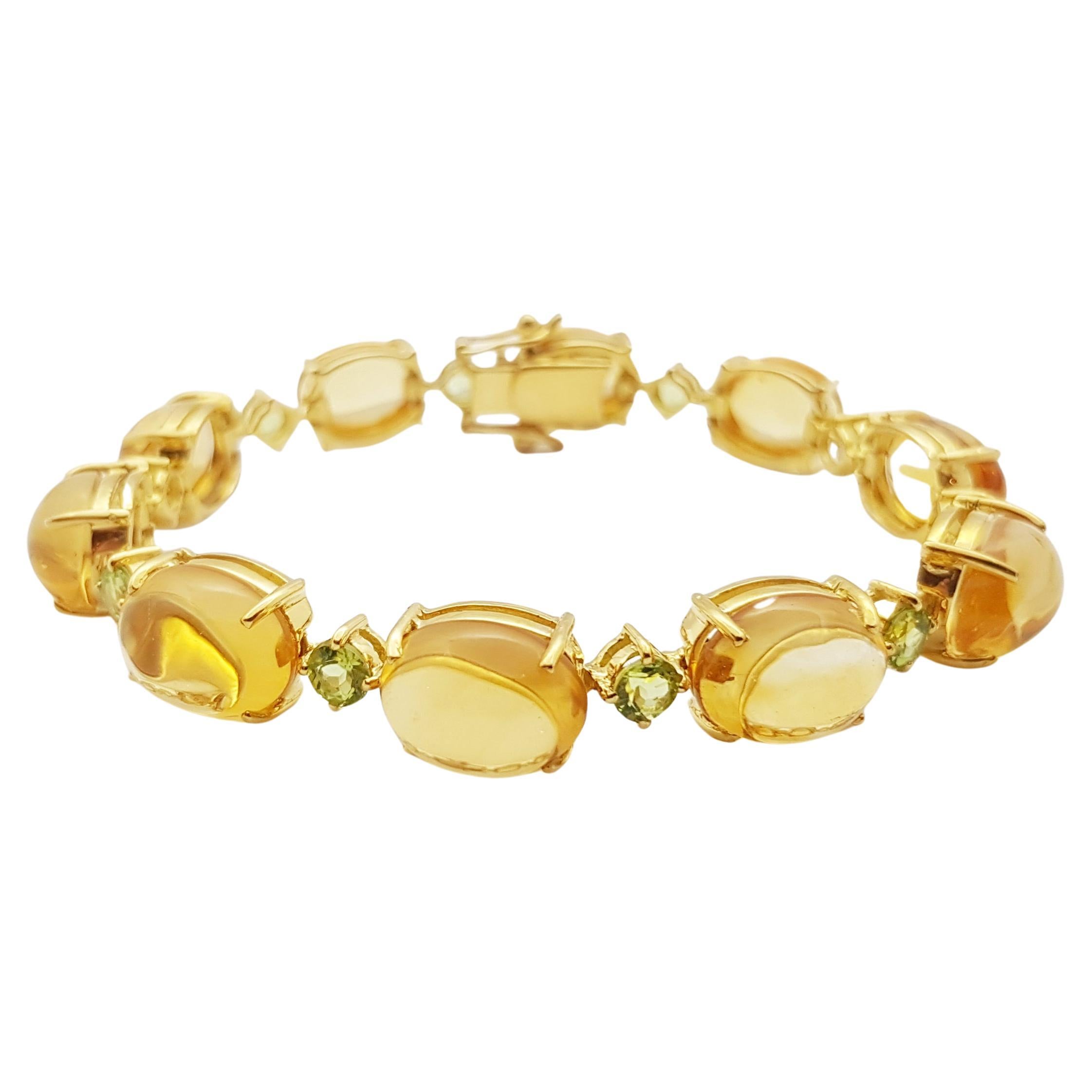 Cabochon Citrine with Peridot Bracelet set in 18 Karat Gold Settings For Sale