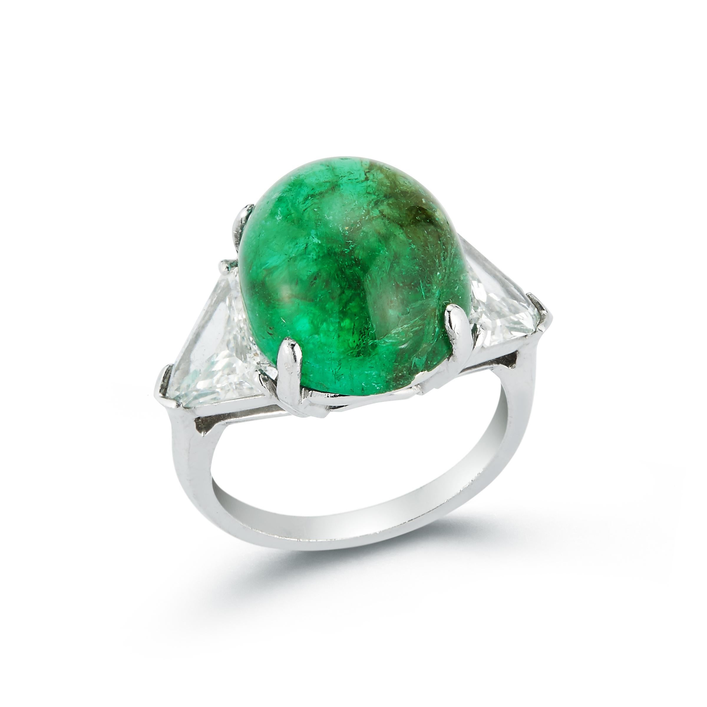 Cabochon Colombian Emerald & Diamond Three Stone Ring set in platinum AGL Certified
Emerald Weight: 12.30 cts
Ring Size: 6
Re-sizable to any size free of charge 
