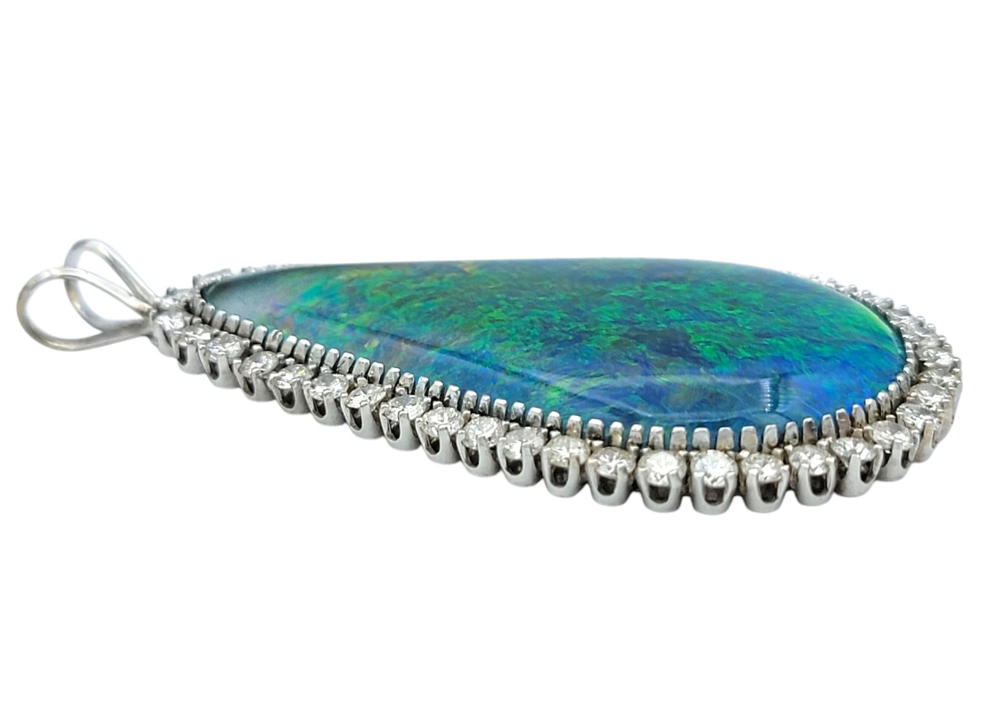 Contemporary Cabochon Cut Black Opal & Diamond Halo Teardrop Pendant in 14 Karat White Gold For Sale