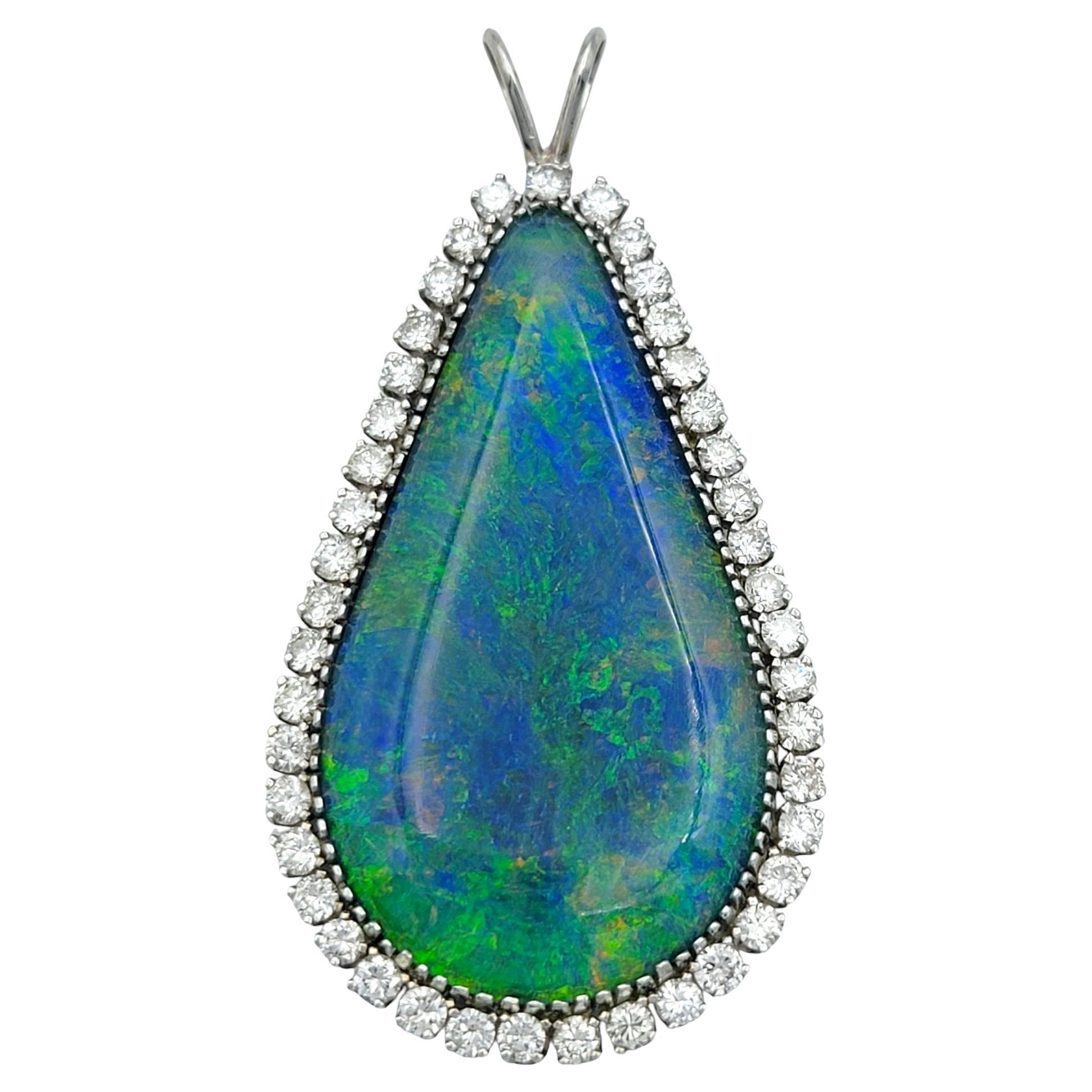 Cabochon Cut Black Opal & Diamond Halo Teardrop Pendant in 14 Karat White Gold