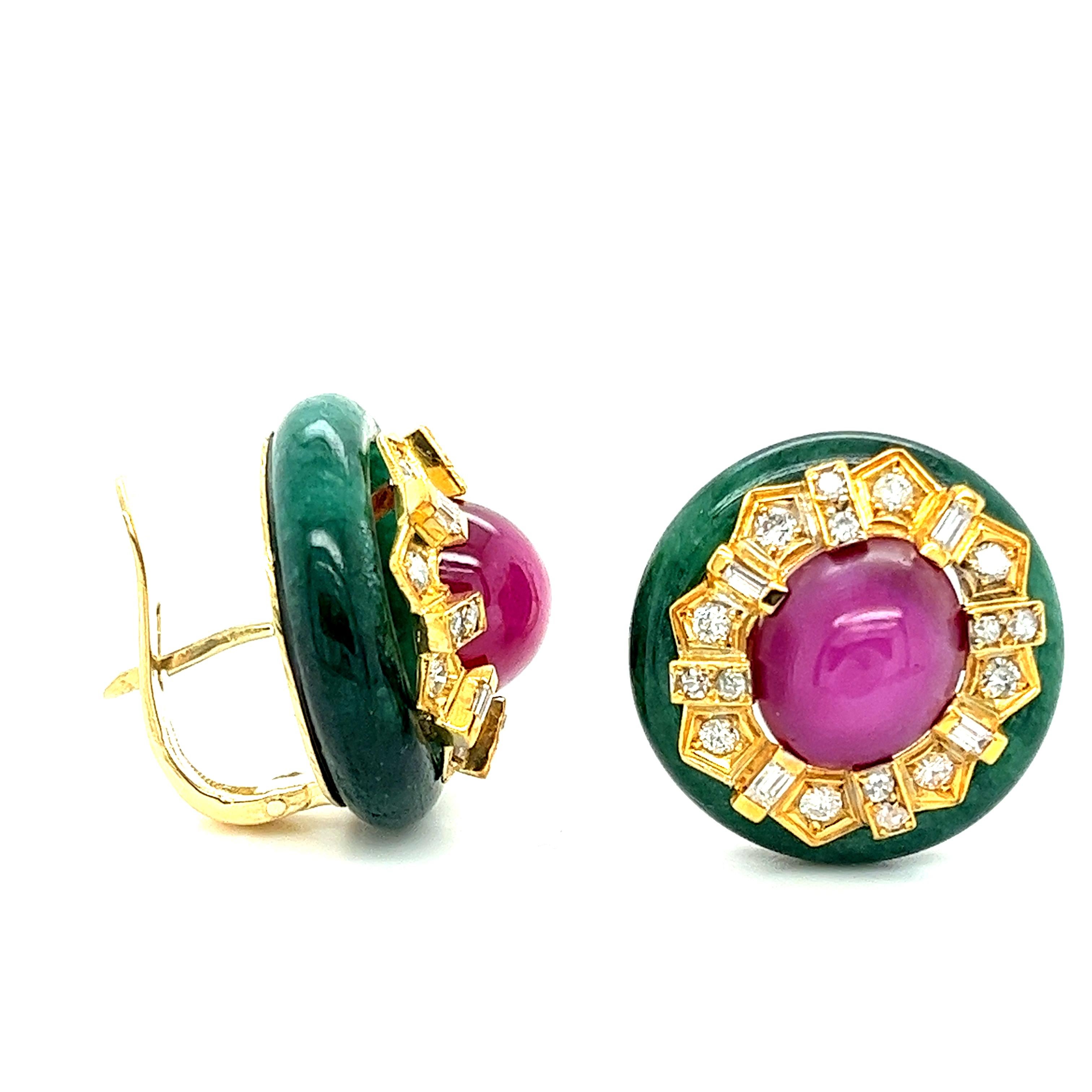 18K Yellow Gold Ruby, Jade and Diamond Ring and Earring Set:

Set in 30.2g of 18K Yellow Gold (17.2g earrings, 13g ring), centering three cabochon-cut rubies (30ct total), and adorned by Jade and white diamonds.

*PLEASE NOTE* 
Rubies have not been