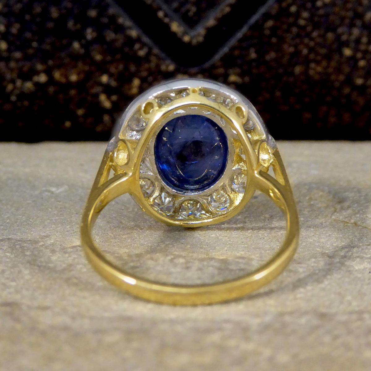 Cabochon Cut Sapphire and Diamond Cluster Ring in 18ct Gold In Good Condition For Sale In Yorkshire, West Yorkshire