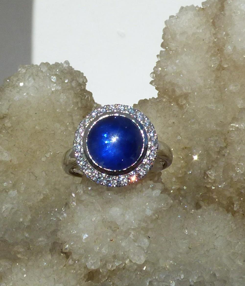 Contemporary Cabochon Cut Sapphire and Diamond Cluster Ring in 18K White Gold For Sale