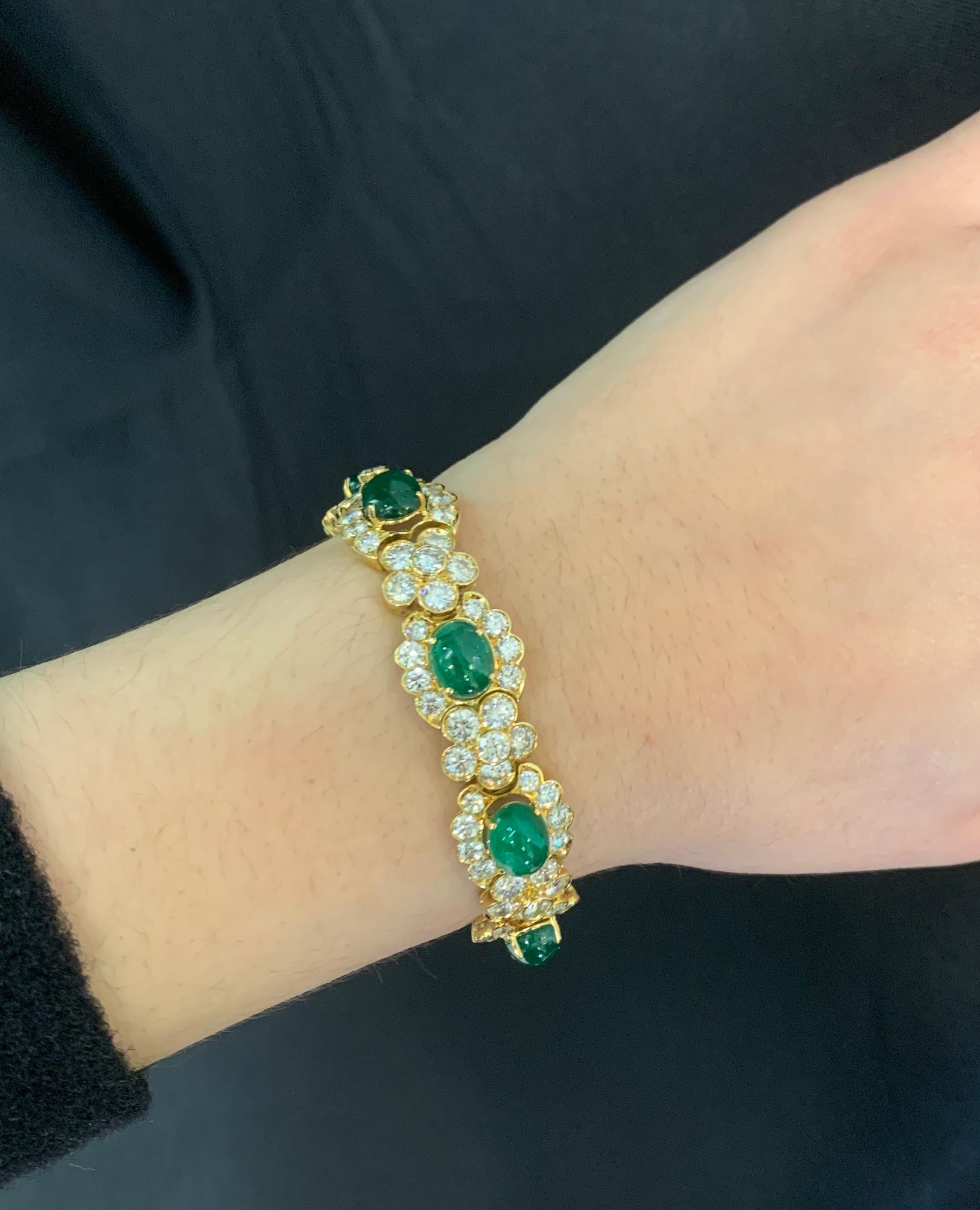 Cabochon Emerald and Diamond Bracelet 
 
Beautiful yellow gold bracelet with floral motif. It features 6 cabochon emeralds and 126 round-cut diamonds. 

Approximate Emerald Weight: 13.60 Carats 
Approximate Diamond Weight: 16.92 Carats
Approximate