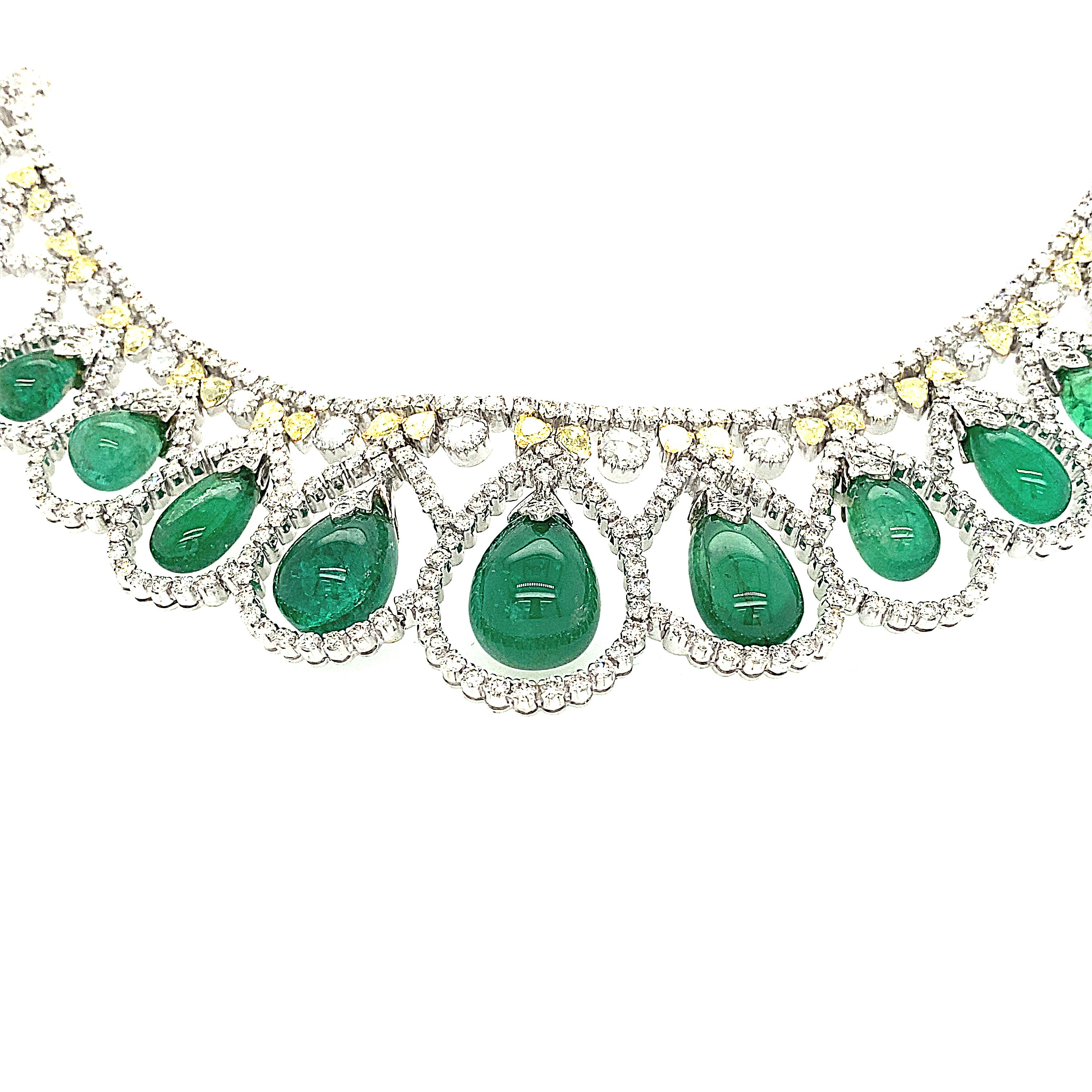 Magnificent Cabochon teardrop shape Emerald and Diamond collier/necklace. There are 74.70 carats of emeralds and 29.19 carats of yellow and white diamonds in 18K white gold. One of a kind, handmade, an extraordinary piece of jewelry.