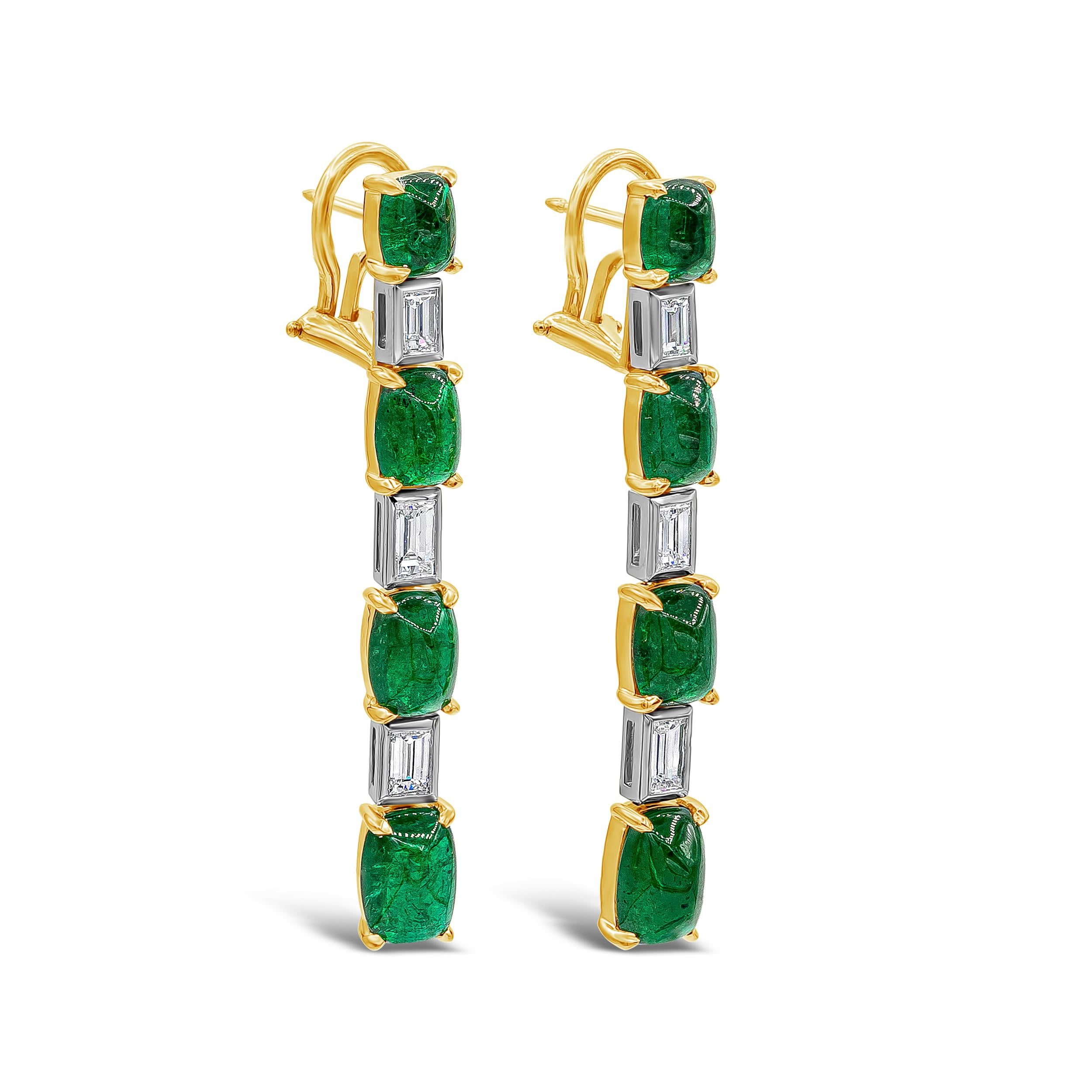 A unique and fashionable pair of drop earrings showcasing cabochon green emeralds that alternate with baguette diamonds, in a yellow gold and platinum mounting. Cabochon green emeralds weigh 10.26 carats total; diamonds weigh 1.22 carats total and