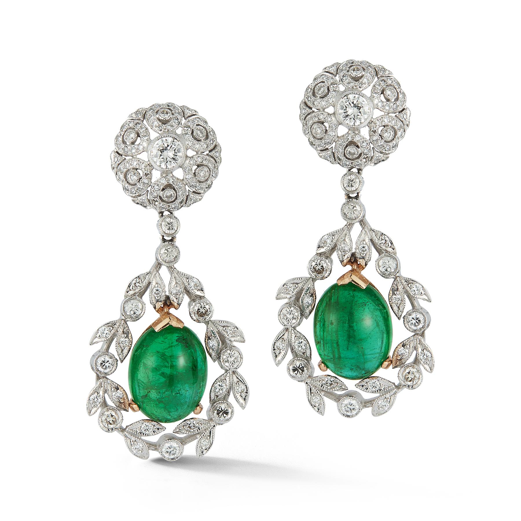 Cabochon Emerald and Diamond Earrings

2 cabochon emeralds weighing approximately 9.65 carats
130 round diamonds weighing approximately 6.53 carats

Length: 1.5